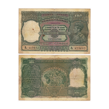 British India, George VI, 100 Rupees, (1938). Calcutta, Signed by C.D Deshmukh, black Seri